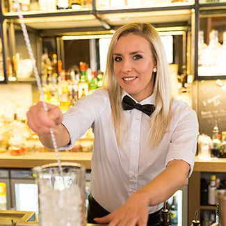 Ada Nadolska Stirring a Drink